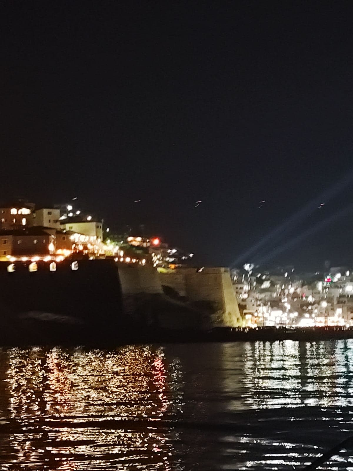Old Town and harbor lights seen from the water